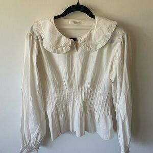 Cream Christy dawn blouse with black side zipper